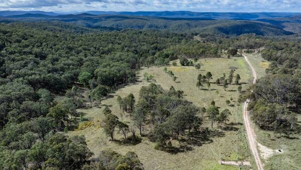 Lifestyle tranquility in a scenic undulating terrain with natural bushland